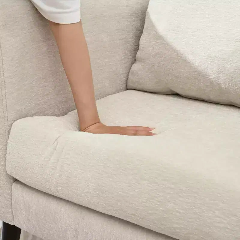 Fauteuil club capitonné, fauteuil baquet avec pieds en bois massif et support lombaire.
